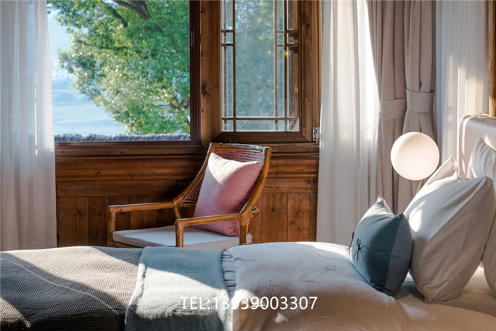 安徽宏村半山詩莉莉中式徽派酒店客房設(shè)計方案賞析