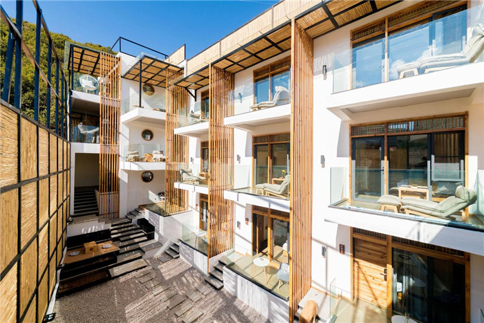 自建房民宿設(shè)計   瀘沽湖敘舊民宿酒店建筑外觀設(shè)計方案